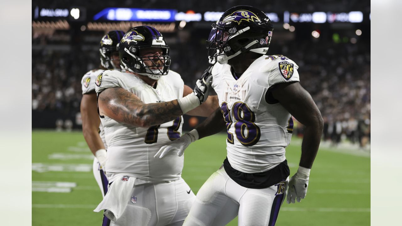 Denver Broncos guard Ben Powers, right, squares off against guard