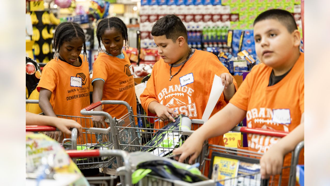 Photos: Broncos partner with King Soopers to take Boys & Girls Club members  back-to-school shopping