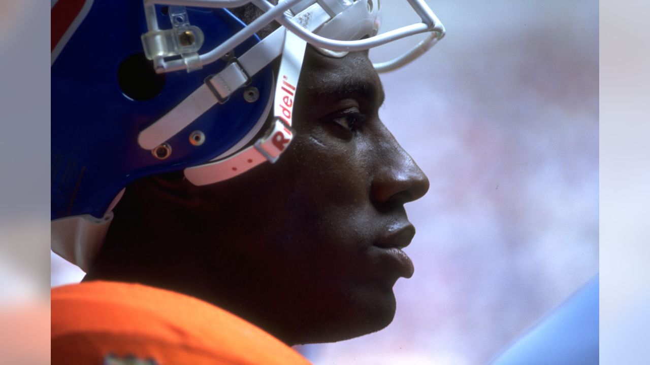 Denver, Colo., November 7, 2004) Dwayne Carswell is tackled by