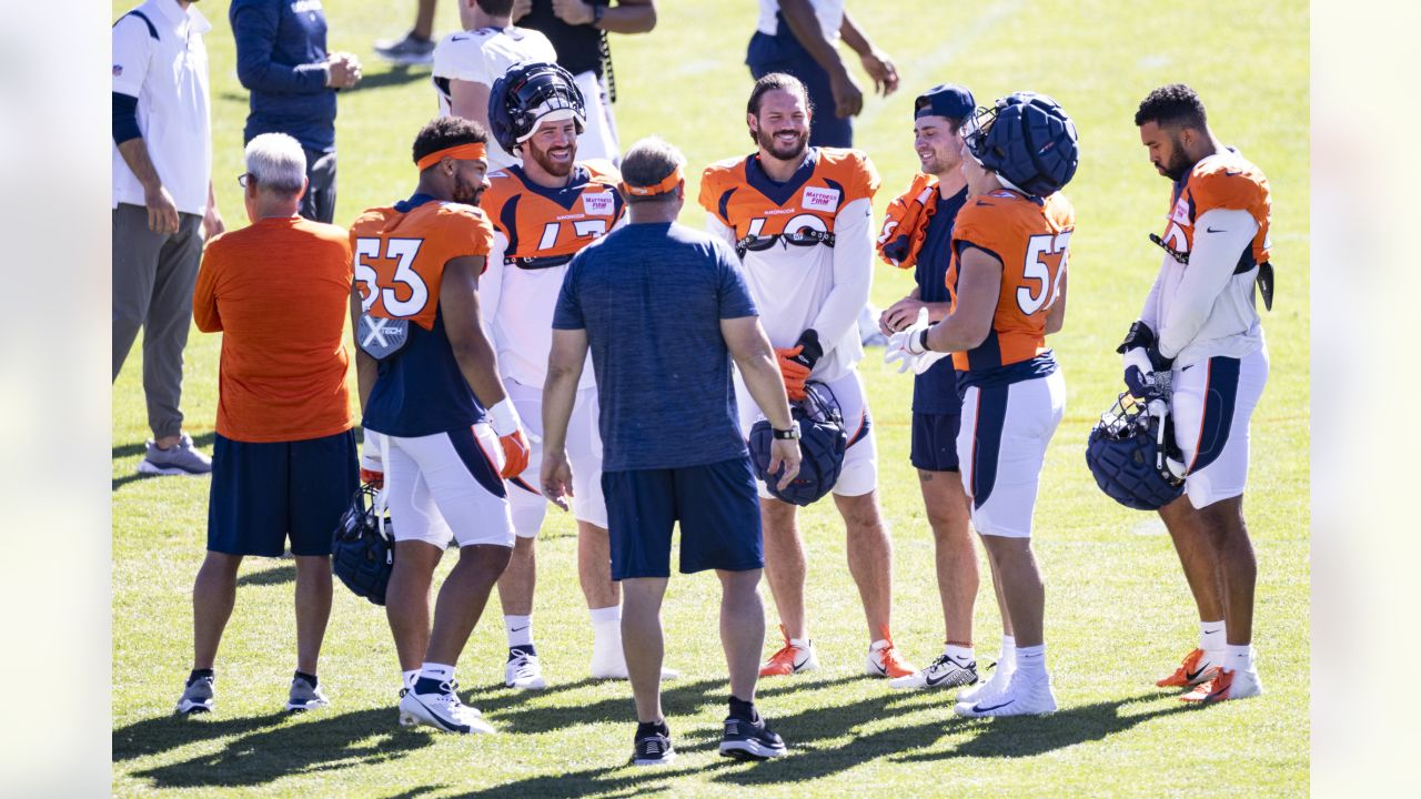 A 2023 Ford Bronco is adorned with the logo of the Denver Broncos while on  display during NFL Welcome Back festivities at the Broncos training camp  Saturday, July 29, 2023, in Centennial