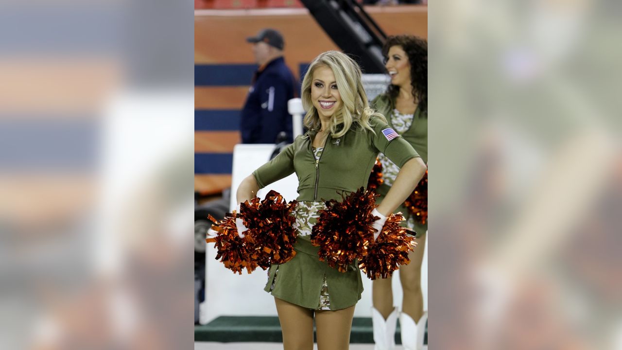 The Denver Broncos cheerleaders wear green to celebrate the NFL's Salute to  Service prior to an NFL football game against the New England Patriots,  Sunday, Nov. 12, 2017, in Denver. (AP Photo/David