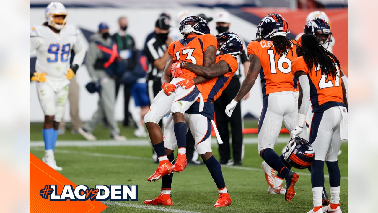 Denver, Colorado, USA. 1st Dec, 2019. Broncos RB PHILLIP LINDSAY starts to  take off his jersey to exchange with a Chargers player during the end of  the game at Empower Field At