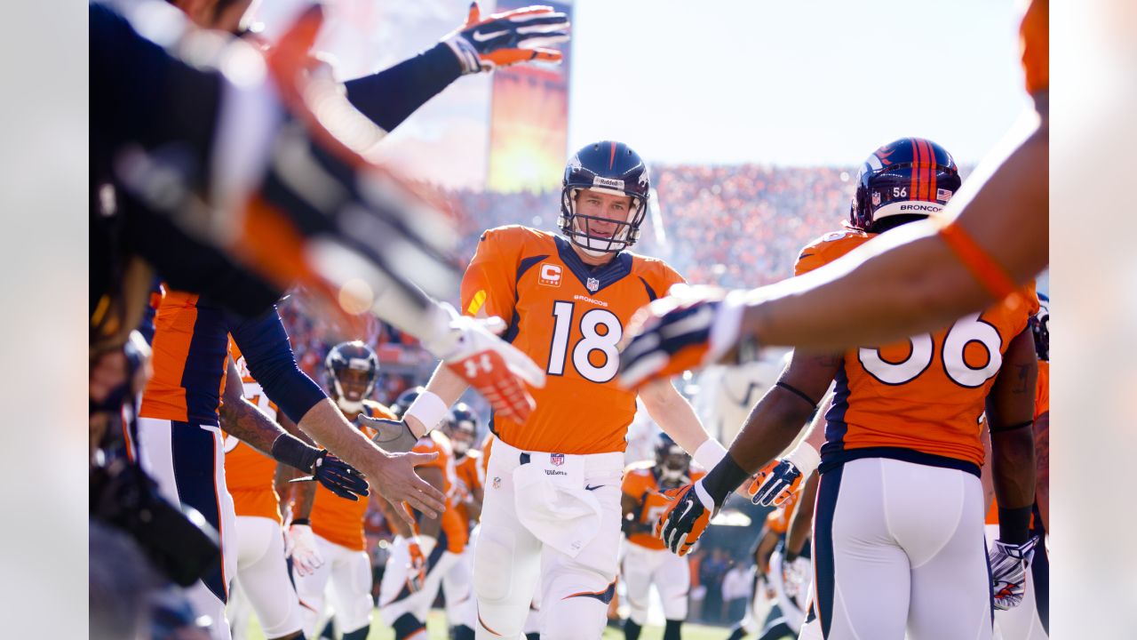 Photo: Denver Broncos C.J. Anderson hugs Head Coach Gary Kubiak