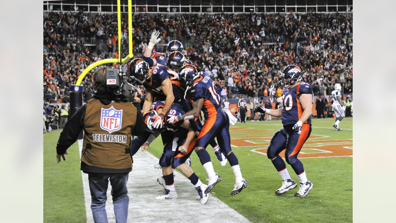 Denver Broncos quarterback Tim Tebow celebrates winning touchdown agains  the New York Jets at Sports Authority Field at Mile High in Denver on  November 17, 2011. Denver came from behind to defeat