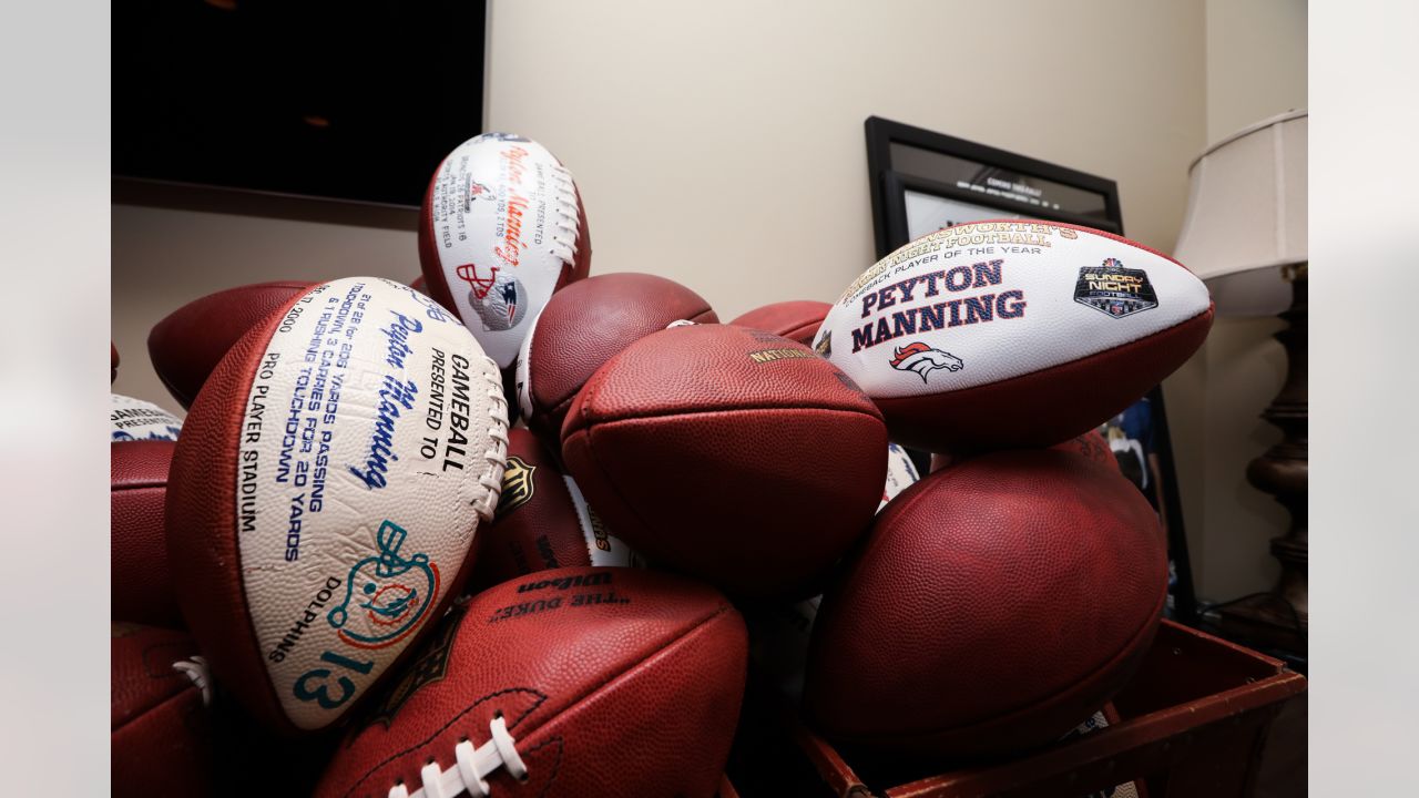 Photos: A peek inside Peyton Manning's game ball collection