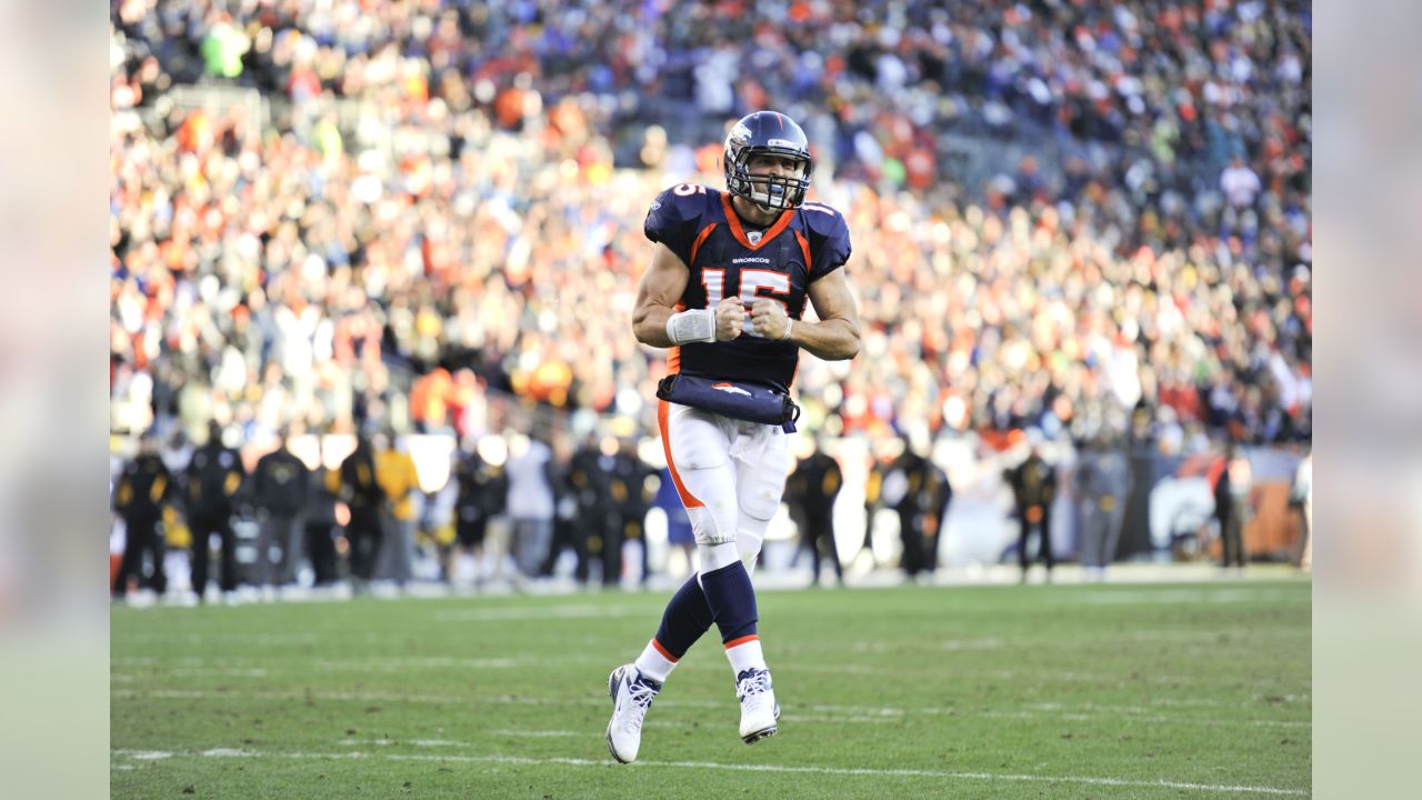 Jan. 8, 2012 - Denver, CO, USA - Denver Broncos QB TIM TEBOW runs for big  yardage against the Steelers during the 1st. half at Sports Authority Field  at Mile High Sunday
