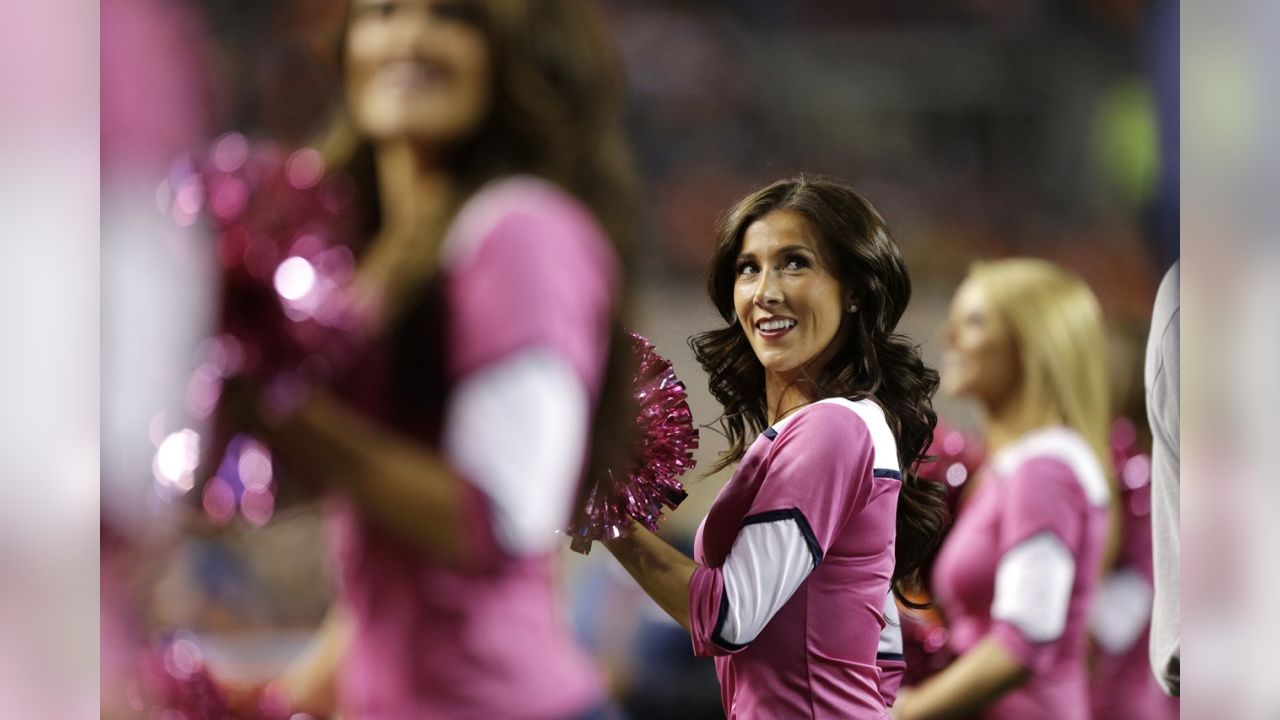 Scenes from the sidelines: NFL cheerleaders wear pink for October