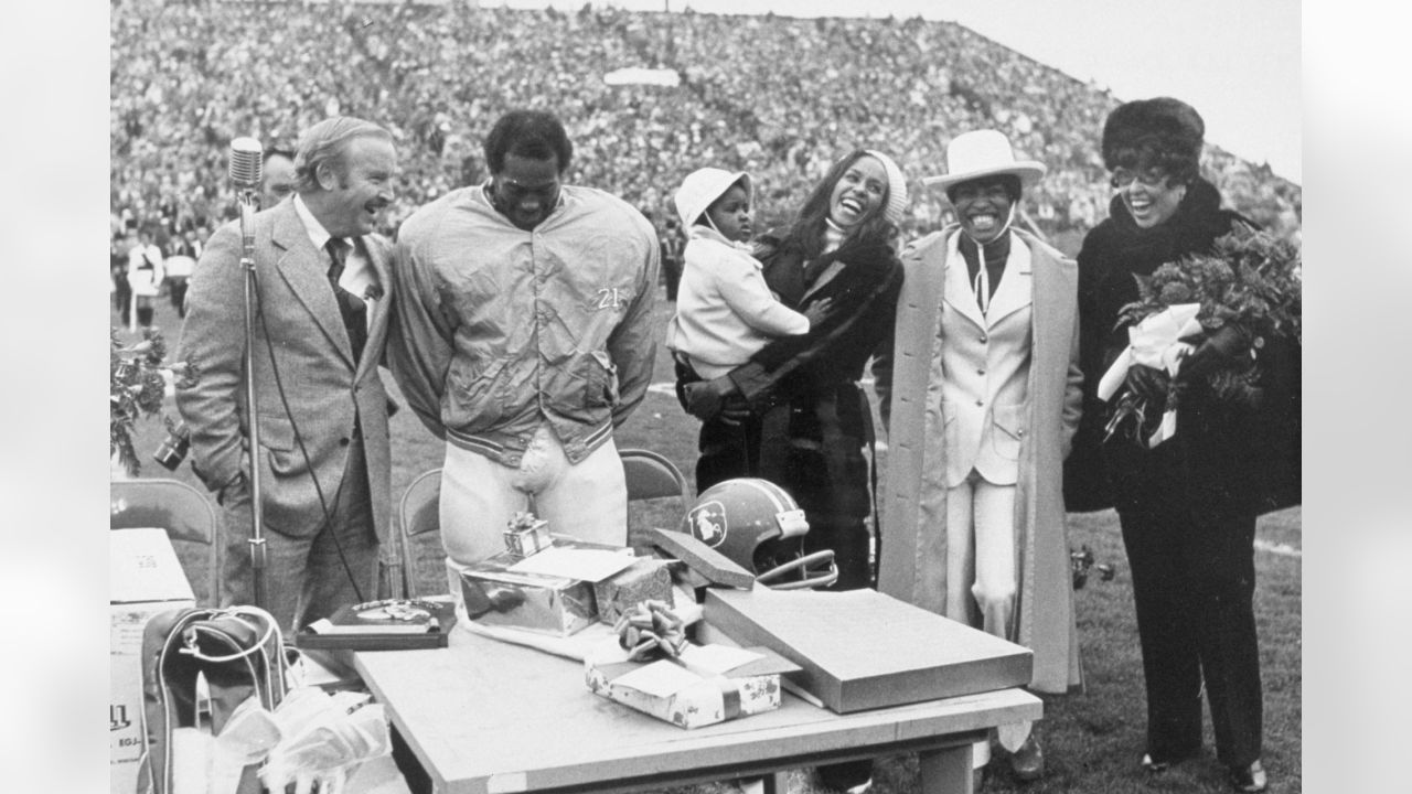 Matt Wilhelm of the Green Bay Packers celebrates with his family