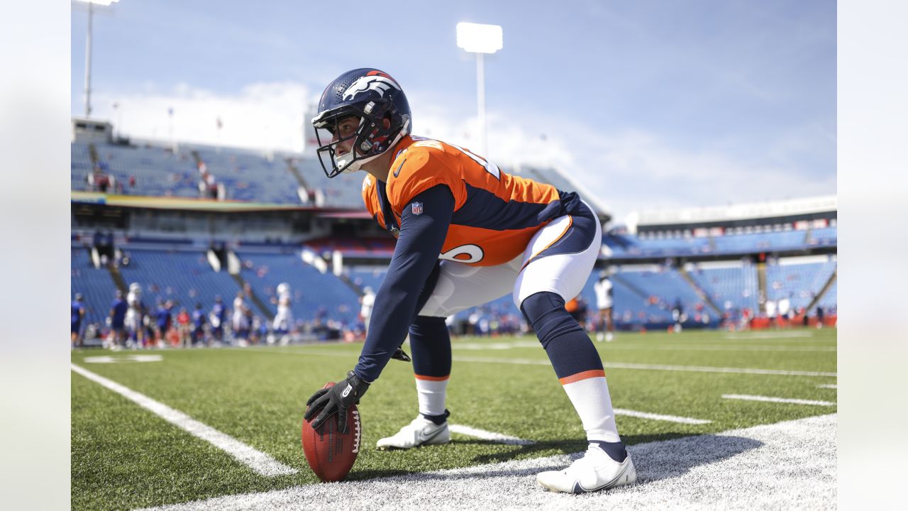 Denver Broncos long snapper Jacob Bobenmoyer walks off the field