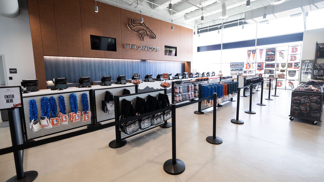 Painting a Broncos Hall of Fame wall at the Empower Field on the Team store.  : r/DenverBroncos