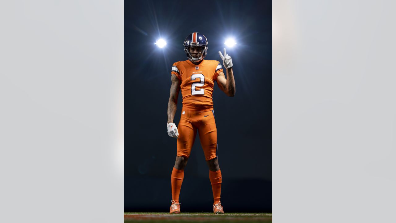 Heath] Did the #Broncos tweak their Color Rush uniform? Top photos are the  throwback logo from last season. Bottom photos are from a video team posted  on Instagram. There's a white background