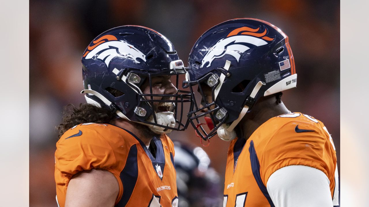 Denver Broncos tight end Eric Tomlinson (87) celebrates as he