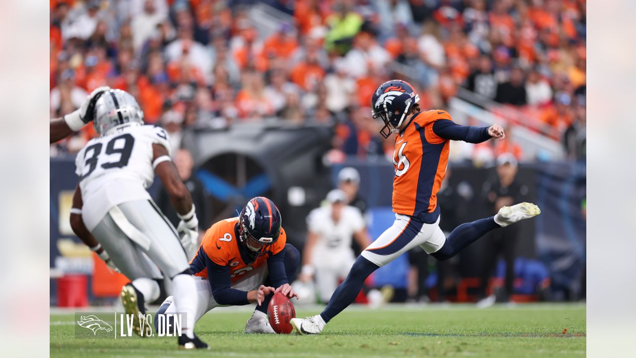 Las Vegas Raiders vs. Denver Broncos. NFL Game. American Football League  match. Silhouette of professional player celebrate touch down. Screen in  back Stock Photo - Alamy