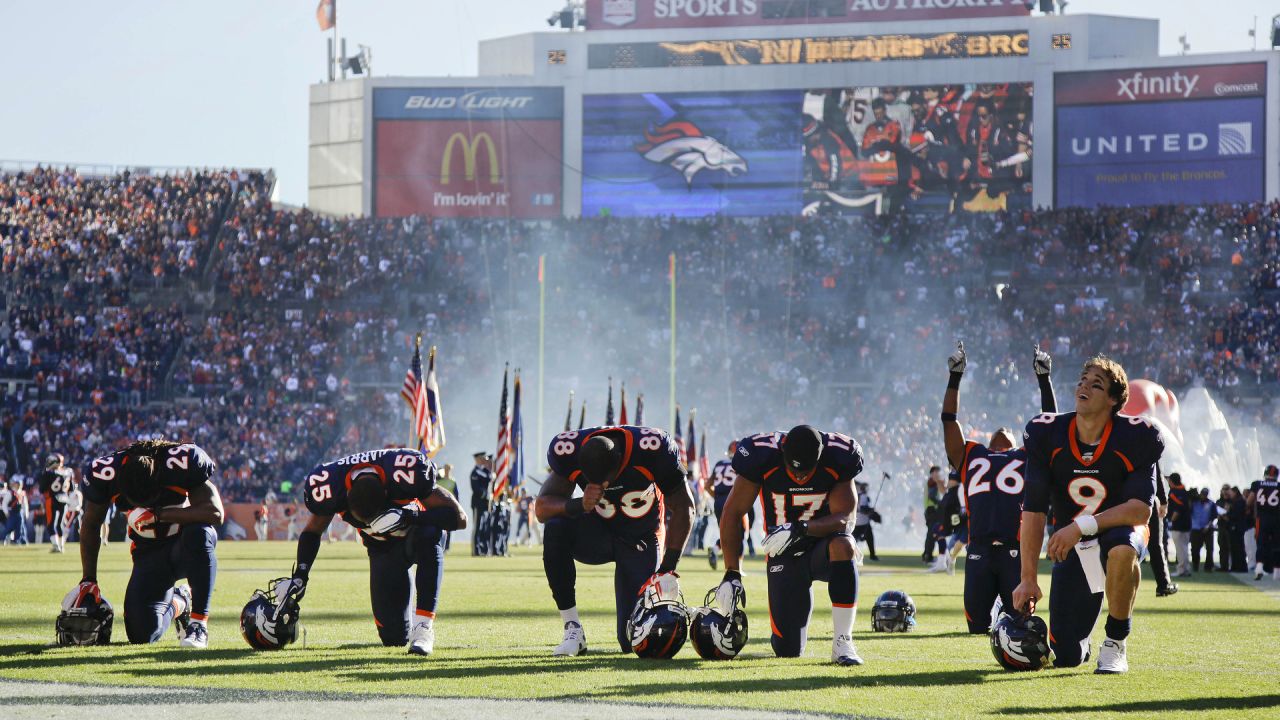 Denver Broncos guard Zane Beadles (68) congratulates wide receiver Demaryius  Thomas (88) after Thomas caught a pass for a touchdown in the third quarter  of an NFL football game, Sunday, Dec. 2