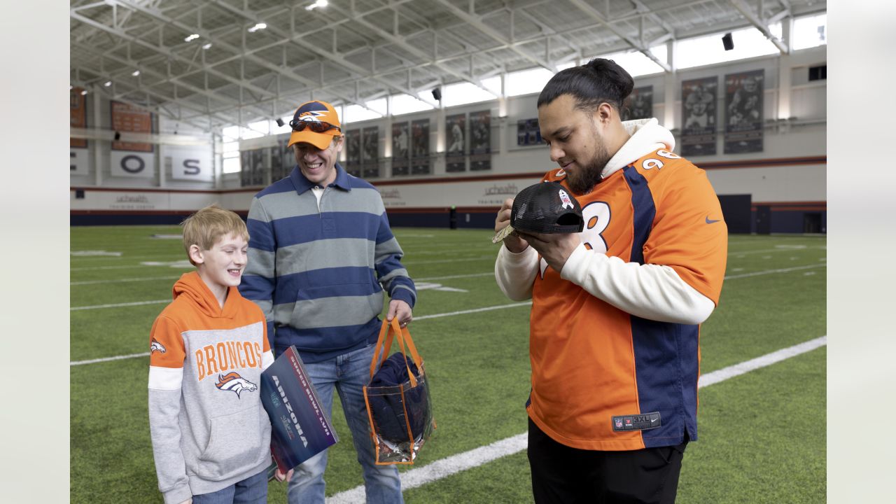 Photos: Mike Purcell surprises Air Force veteran with tickets to