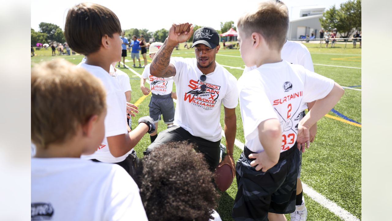 Javonte Williams, Pat Surtain II help inspire next generation at youth  football camp