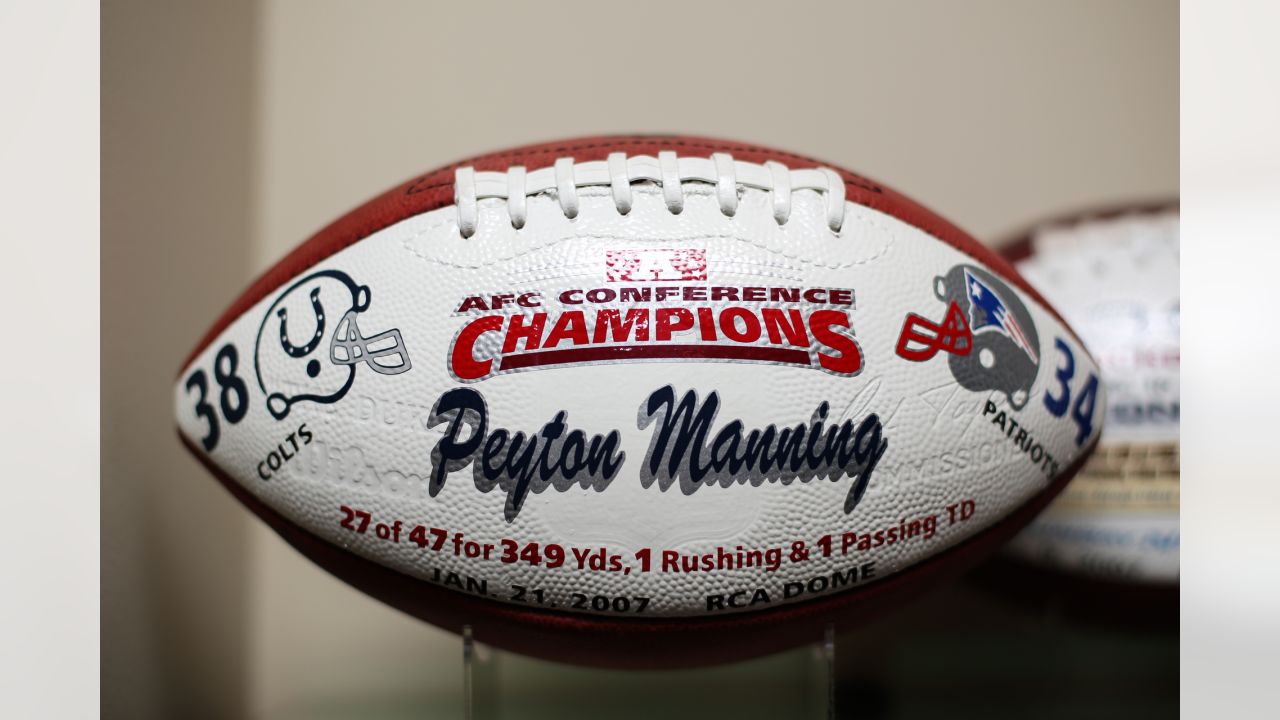 Champ Football Signed by (4) with Peyton Manning, Eli Manning