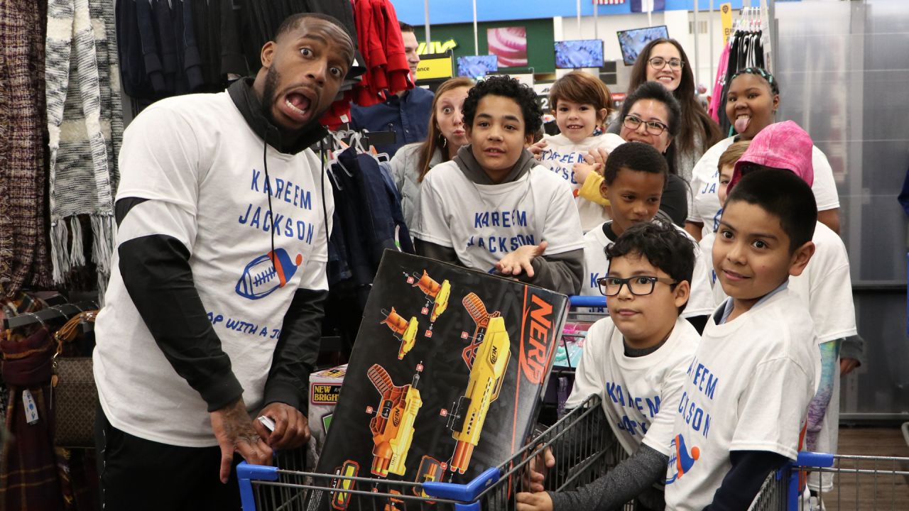 Kids go on a shopping spree with Denver Broncos players