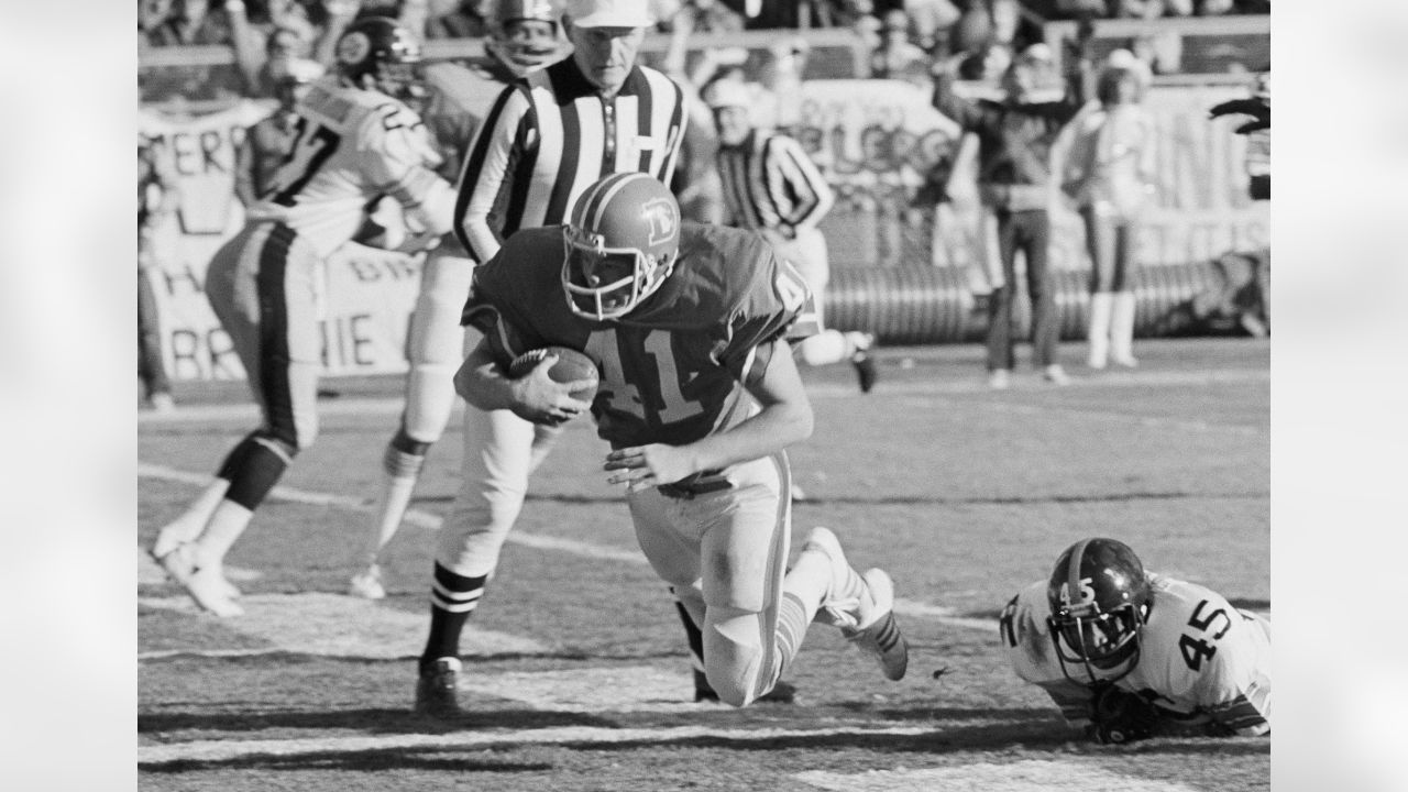 Throwing it back: Photos of the Broncos' Christmas Eve win in their first  playoff game