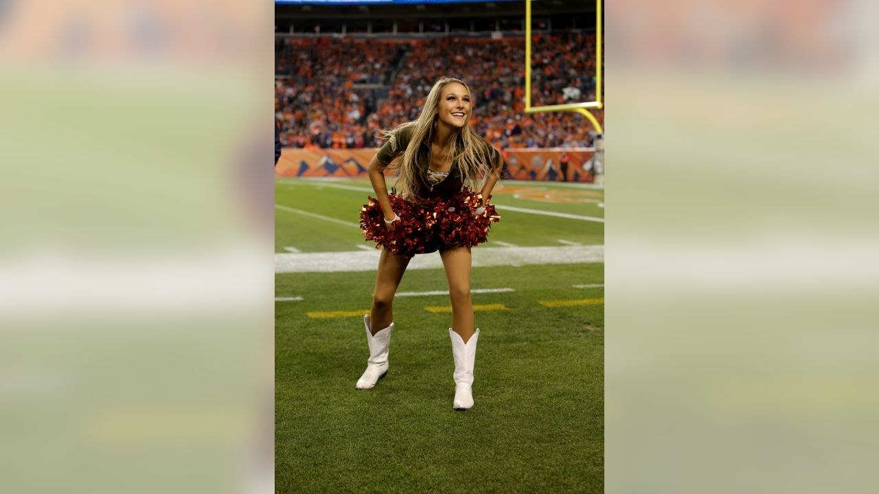 The Denver Broncos cheerleaders wear green to celebrate the NFL's Salute to  Service prior to an NFL football game against the New England Patriots,  Sunday, Nov. 12, 2017, in Denver. (AP Photo/David