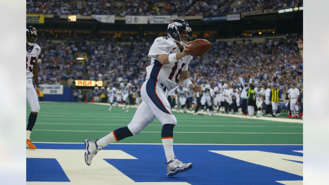 Denver Broncos wide receiver Emmanuel Sanders (10) catches a pass against  Houston Texans safety Kendrick Lewis during the first quarter at Sports  Authority Field at Mile High on August 23, 2014 in