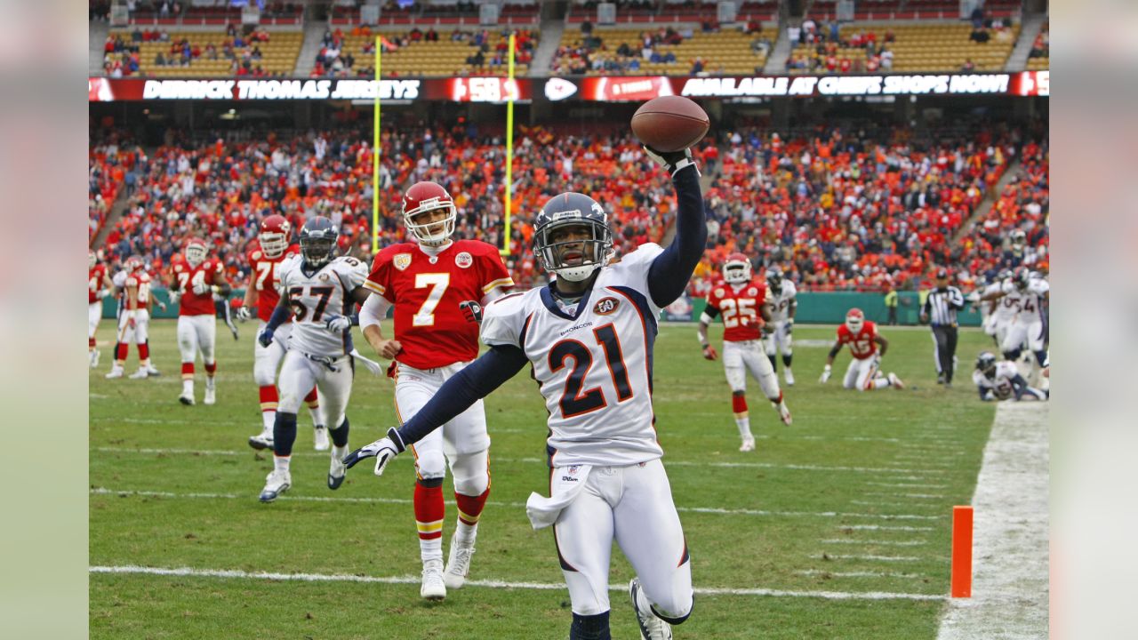 Kansas City Chiefs safety Greg Wesley tore the helmet off of Denver Broncos  running back Mike Bell in the fourth quarter at Invesco Field at Mile High  in Denver, Colorado, Sunday, September