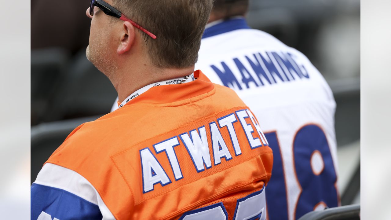 Steve Atwater receives Pro Football Hall of Fame Ring of Excellence during  pregame ceremony