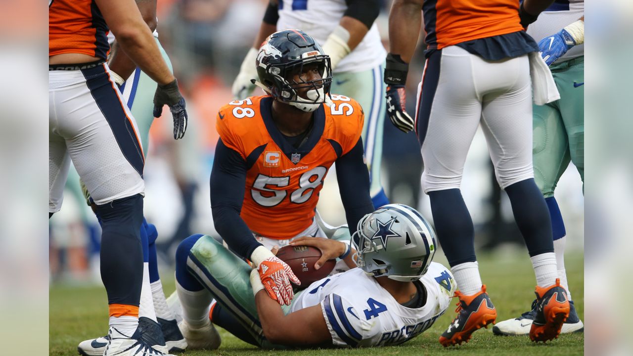 Von Miller (58) enters the field before the first half against the Tampa  Bay Buccaneers at Sports Au…