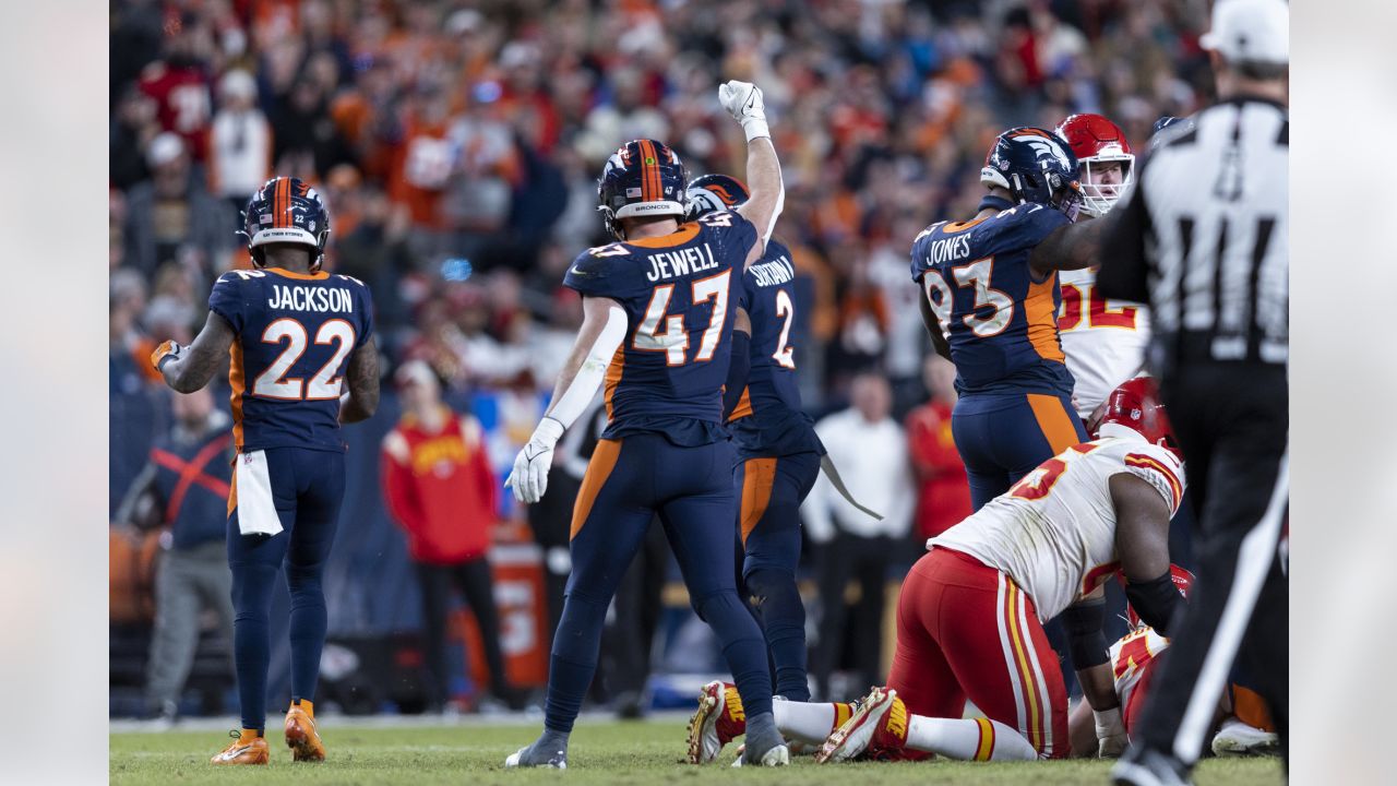 Denver Broncos wide receiver Jalen Virgil (15) celebrates a touchdown by  running back Jerick McKinnon (1) against the Denver Broncos during the  first half of an NFL football game, Sunday, Dec. 11