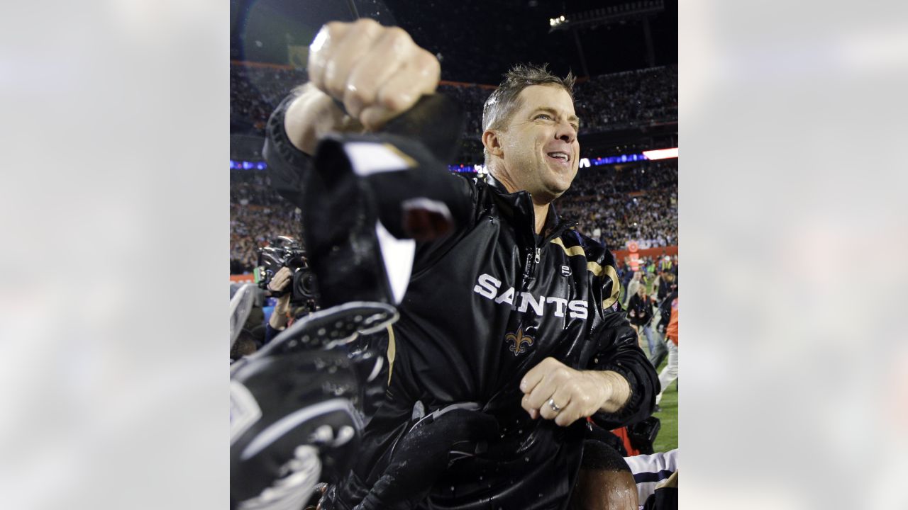 New Orleans Saints quarter back Drew Brees kisses the Vince Lombardi trophy  after winning Super Bowl XLIV at Sun Life Stadium in Miami on February 7,  2010. The Saints defeated the Indianapolis