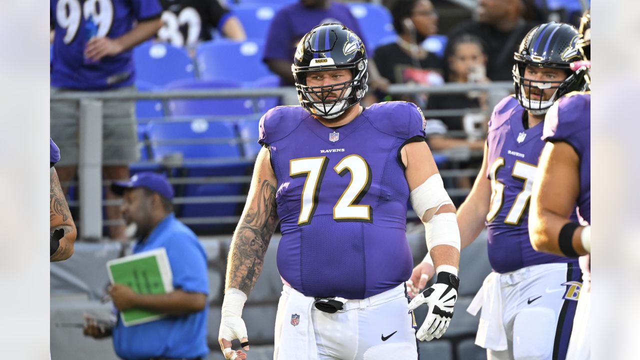 Denver Broncos guard Ben Powers, right, squares off against guard