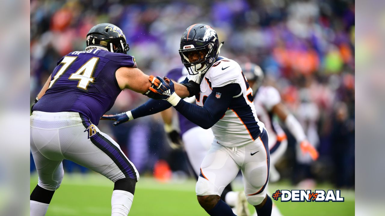 Lindsay ejected as Ravens beat Broncos, 27-14 in wild game