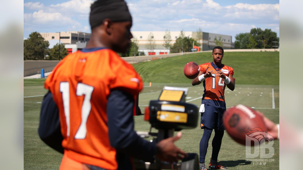 Denver Broncos wide receiver DaeSean Hamilton, left, celebrates