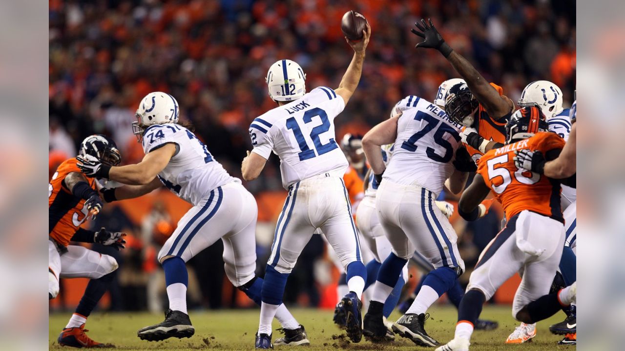 Indianapolis Colts quarterback Andrew Luck (12) greets Denver