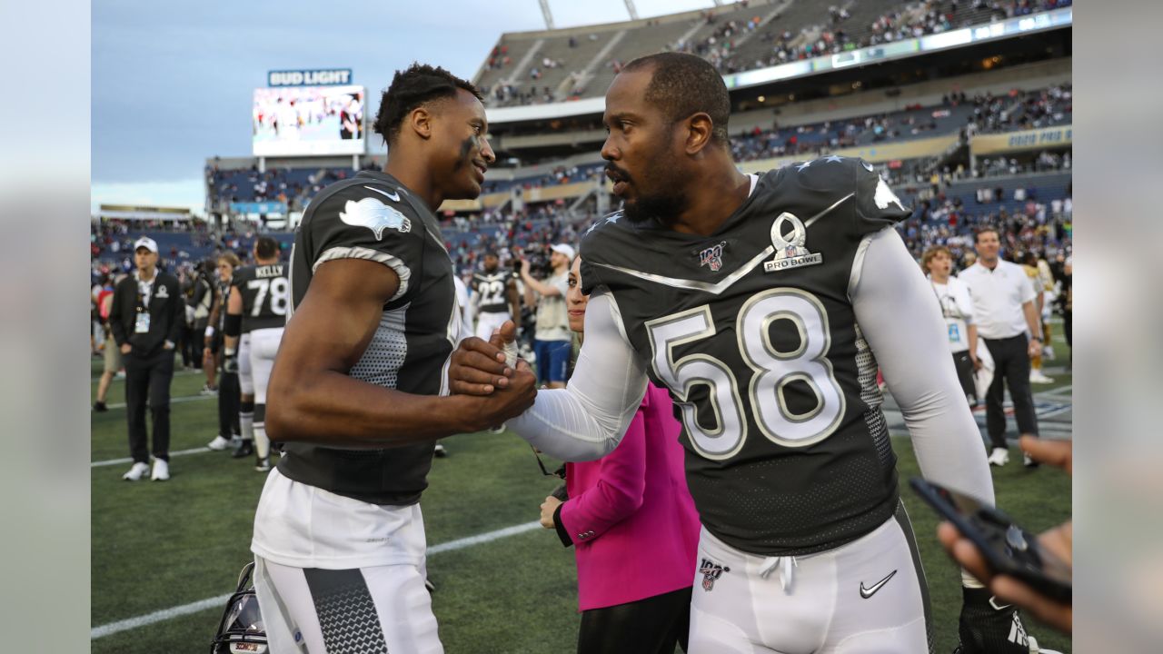 AFC running back Derrick Henry of the Tennessee Titans (22) and quarterback Lamar  Jackson of the Baltimore Ravens (8) during the Pro Bowl, Sunday, Jan. 26,  2020, at Camping World Stadium in