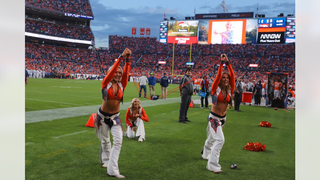 DENVER, CO - OCTOBER 06: A Denvers Broncos Cheerleader preforms during an  NFL game between the Indianapolis Colts and the Denver Broncos on October  06, 2022 at Empower Field at Mile High