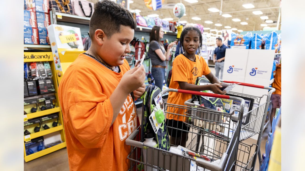 Photos: Broncos partner with King Soopers to take Boys & Girls Club members  back-to-school shopping