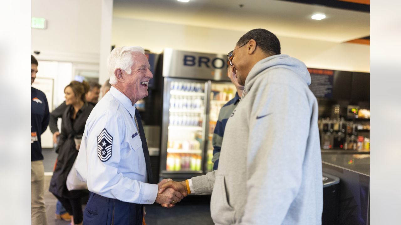 Photos: Mike Purcell surprises Air Force veteran with tickets to