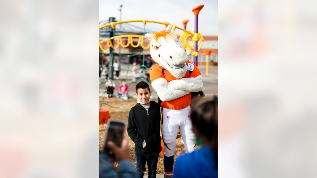 Miles, the Denver Broncos' mascot, pumps up the crowd in his Air