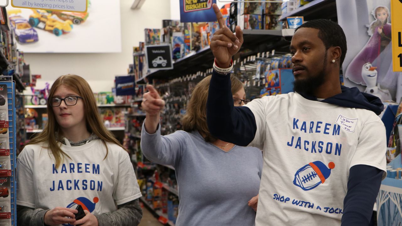 Kids go on a shopping spree with Denver Broncos players