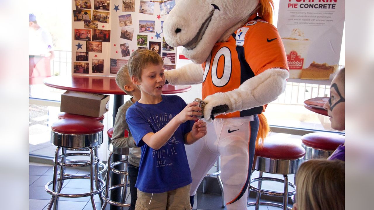 Broncos cheerleaders and mascot visit State Fairgrounds vax site