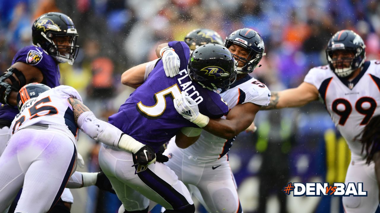 Lindsay ejected as Ravens beat Broncos, 27-14 in wild game