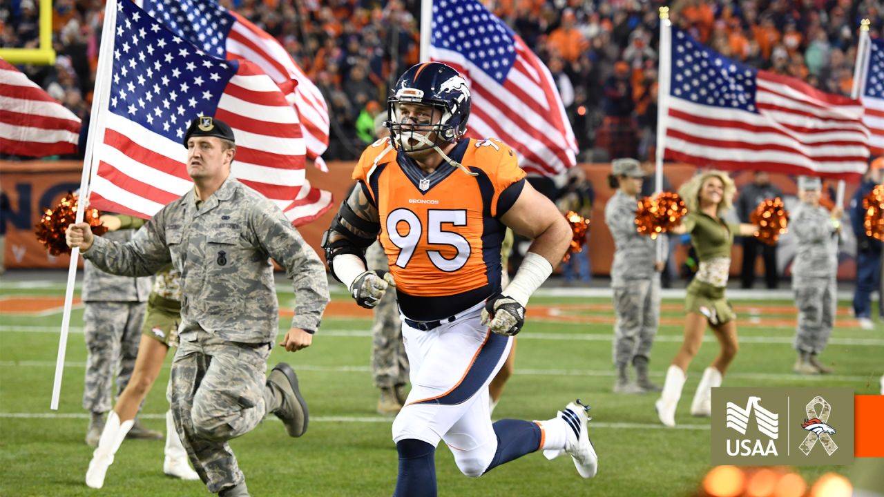 Salute to Service signage is posted on the goalpost before an NFL