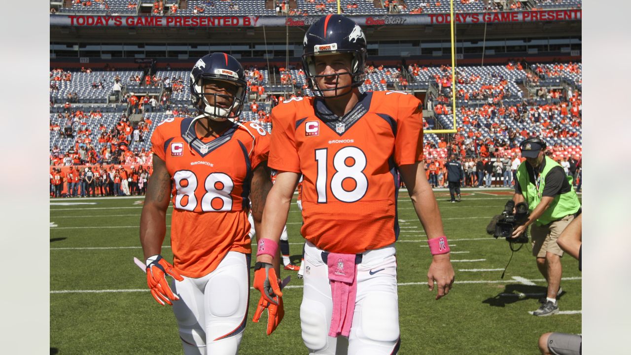 Quarterback Peyton Manning (18) congratulates Demaryius Thomas (88