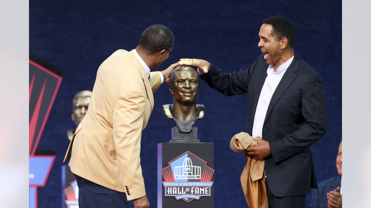 Steve Atwater receives Pro Football Hall of Fame Ring of Excellence during  pregame ceremony