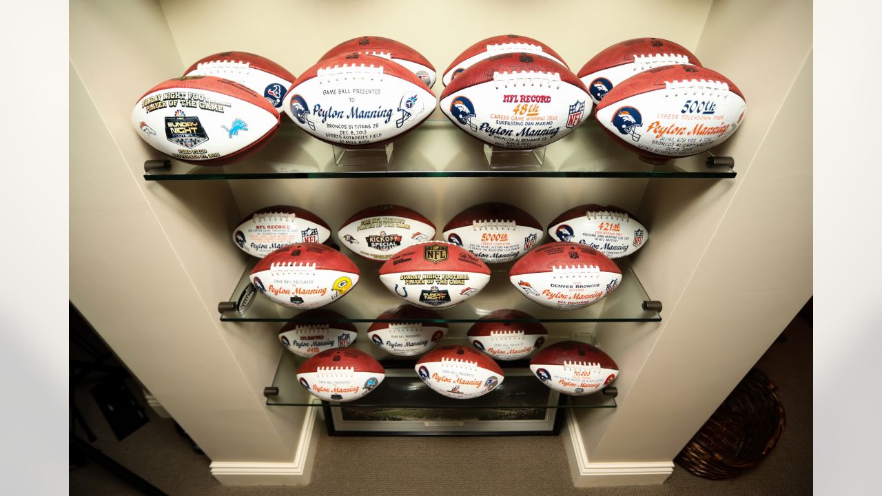 Photos: A peek inside Peyton Manning's game ball collection