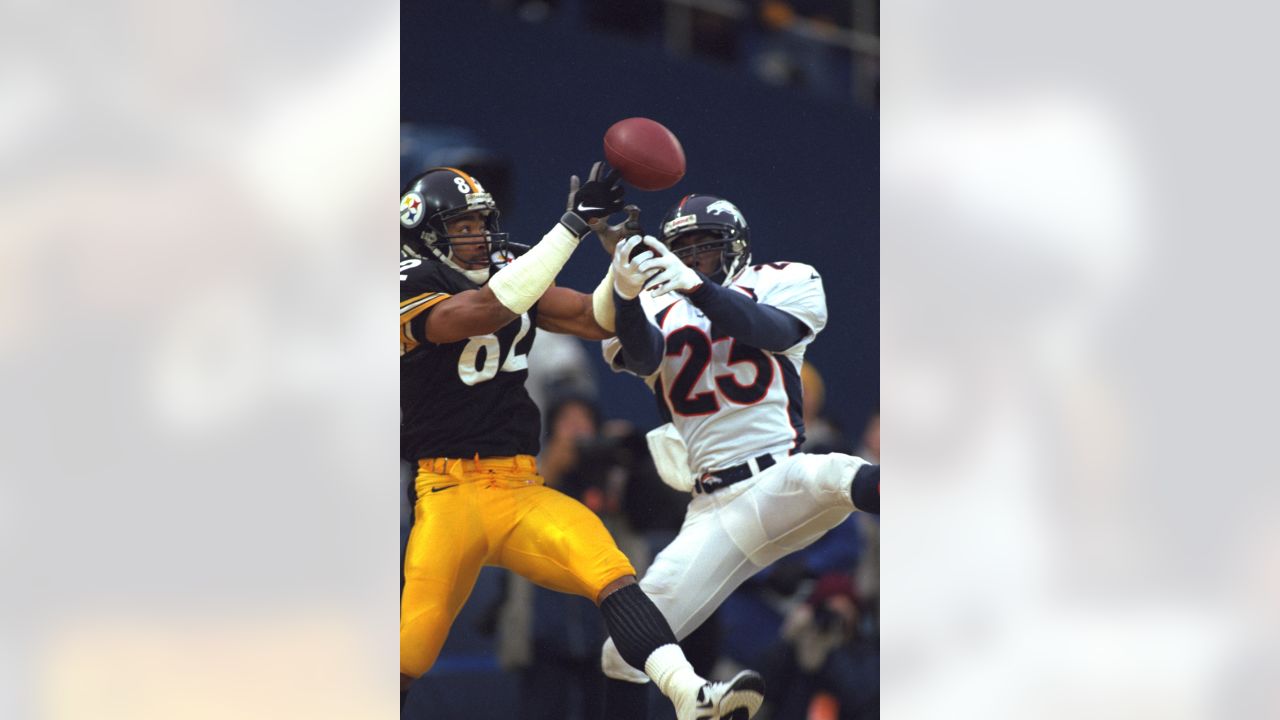 Denver Broncos wide receiver Demaryius Thomas (88) and running back C.J.  Anderson (22) celebrate after Thomas made a touchdown catch in the first  half of an NFL football game against the Pittsburgh