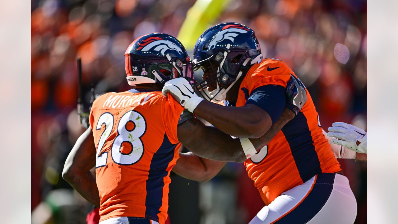 Denver Broncos offensive tackle Quinn Bailey (75) runs during a