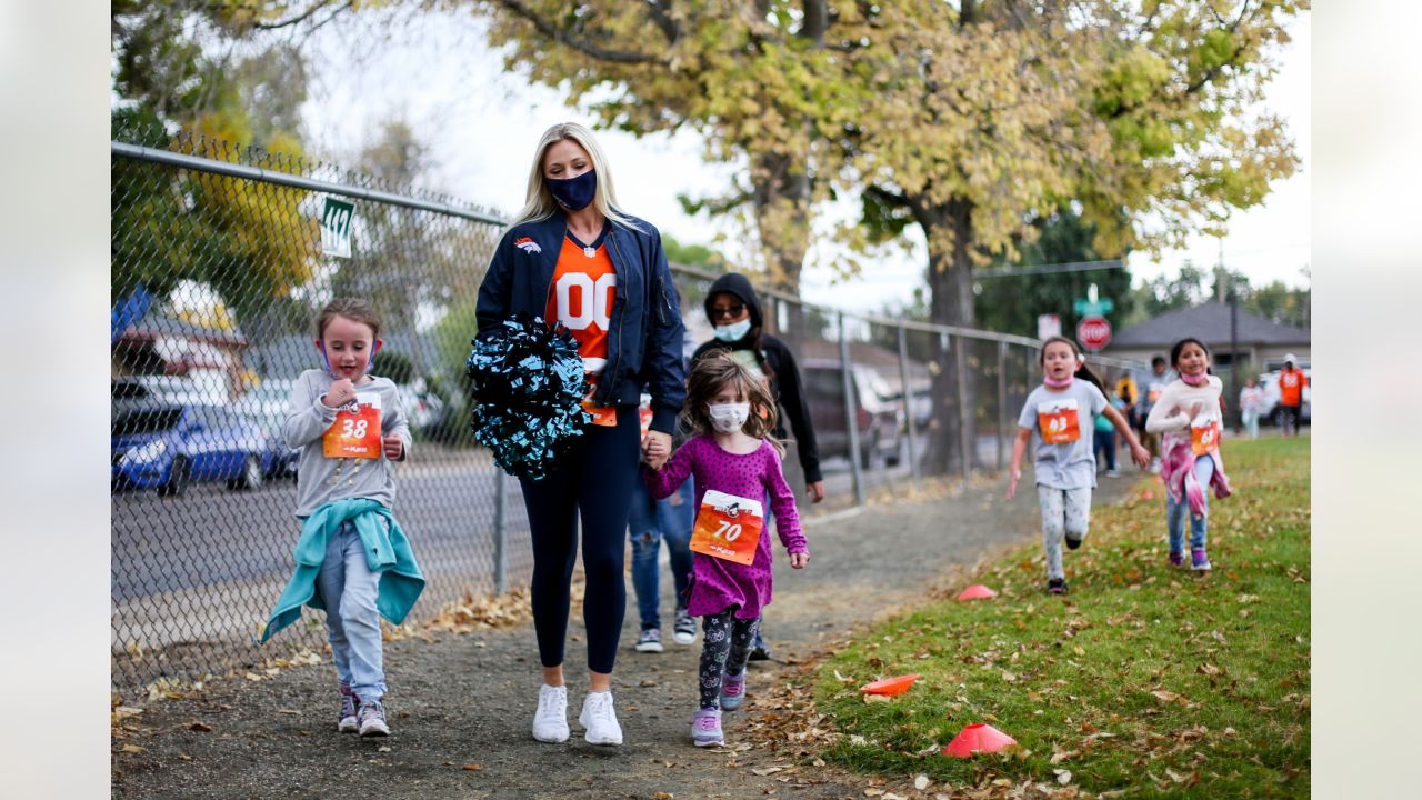 Broncos cheerleaders and mascot visit State Fairgrounds vax site