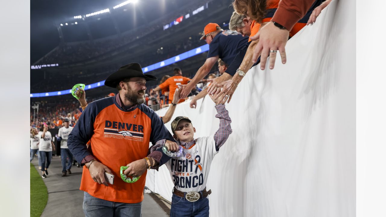 Photos: Broncos honor those impacted by cancer with Fight Like A Bronco  game in Week 5